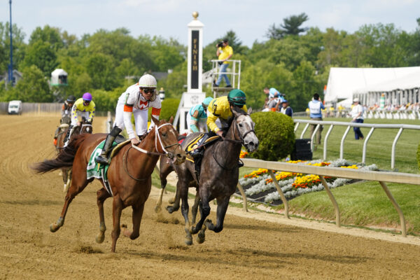 May 19, 2023; Baltimore, Maryland, USA; Maple Leaf Mel with Joel Rosario up (6) leads Topay with Tyler Gaffalione up (5) into turn one of the Miss Preakness S. Presented by Case Tractor at Pimlico Race Course. Mandatory Credit: Gregory Fisher-USA TODAY SportsHorse Racing: Black Eyed Susan